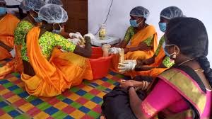 Women processing food products in the modular EC poultry and livelihood scaling model